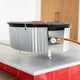 El Paeller Paella Wind Shield - wind shield set up around a paella pan on a burner
